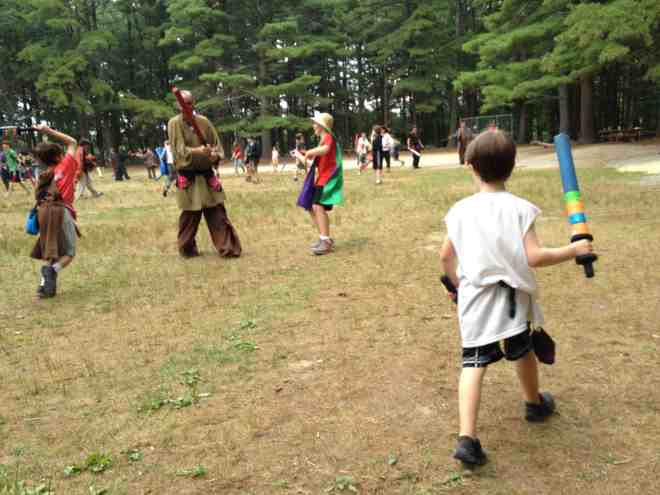 A boy sees his opening and makes his move on the field of battle at the Wizards & Warriors Summer Camps and Adventures  (Photo: Ethan Gilsdorf)