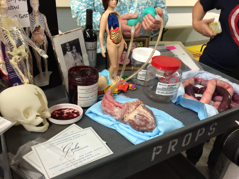 Props, including a beating heart (note the person handling the air bulbs)