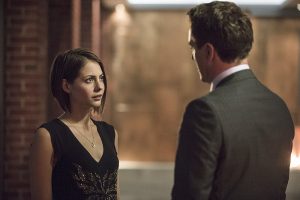 Arrow -- "The Secret Origin of Felicity Smoak" -- Image AR305b_0260b -- Pictured (L-R): Willa Holland as Thea Queen and John Barrowman as Malcolm Merlyn -- Photo: Cate Cameron/The CW -- �© 2014 The CW Network, LLC. All Rights Reserved.