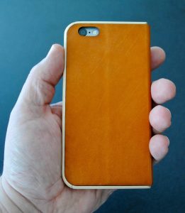 leather and wood add warmth to the iPhone