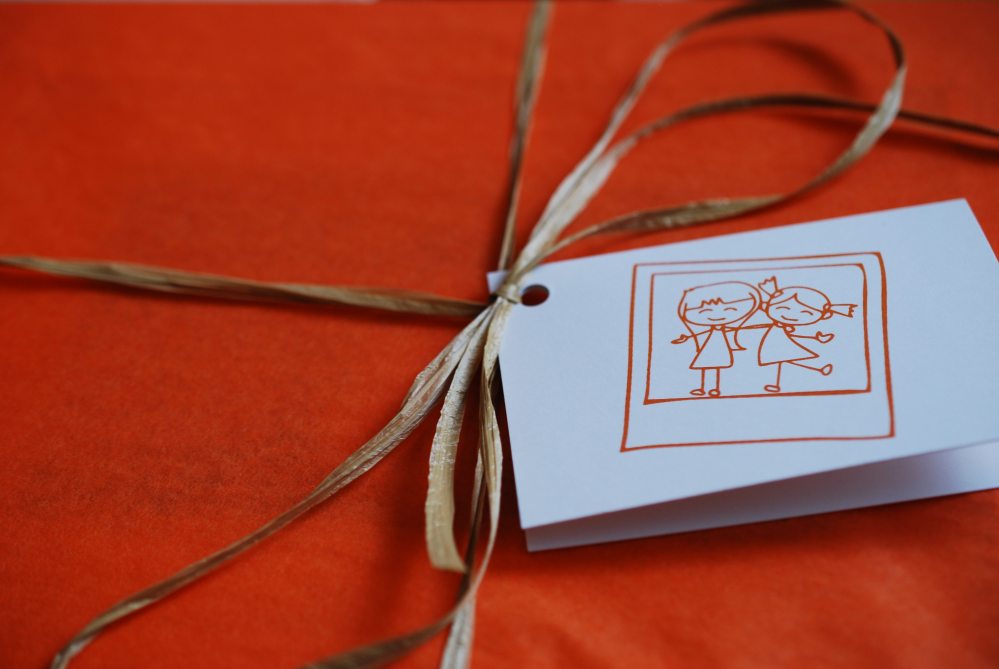 Orange tissue paper and a personalized note. Photo: Jenny Bristol