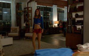The headband and hot pants were actually parts of Supergirl's costume, but not at the same time.
