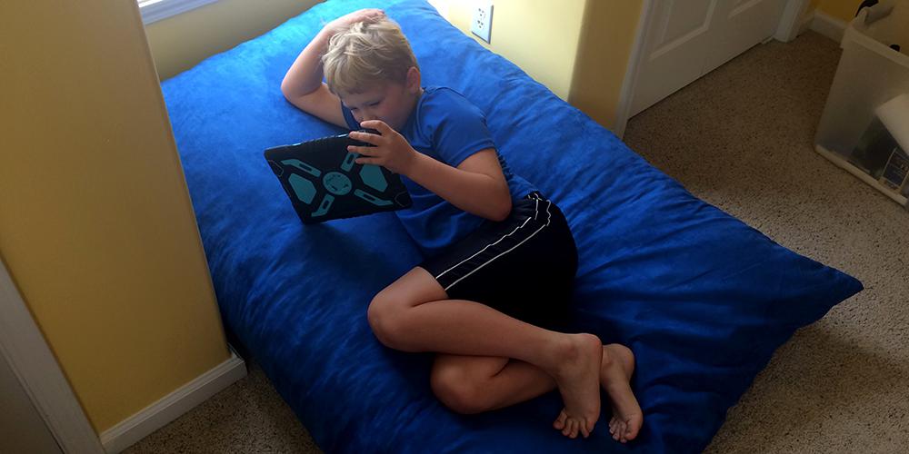 Lounging on the Sumo Omni Plus bean bag chair