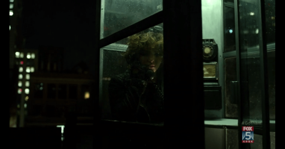 A youngster using a phone booth. The fakest Gotham scene ever. (Image via FOX)