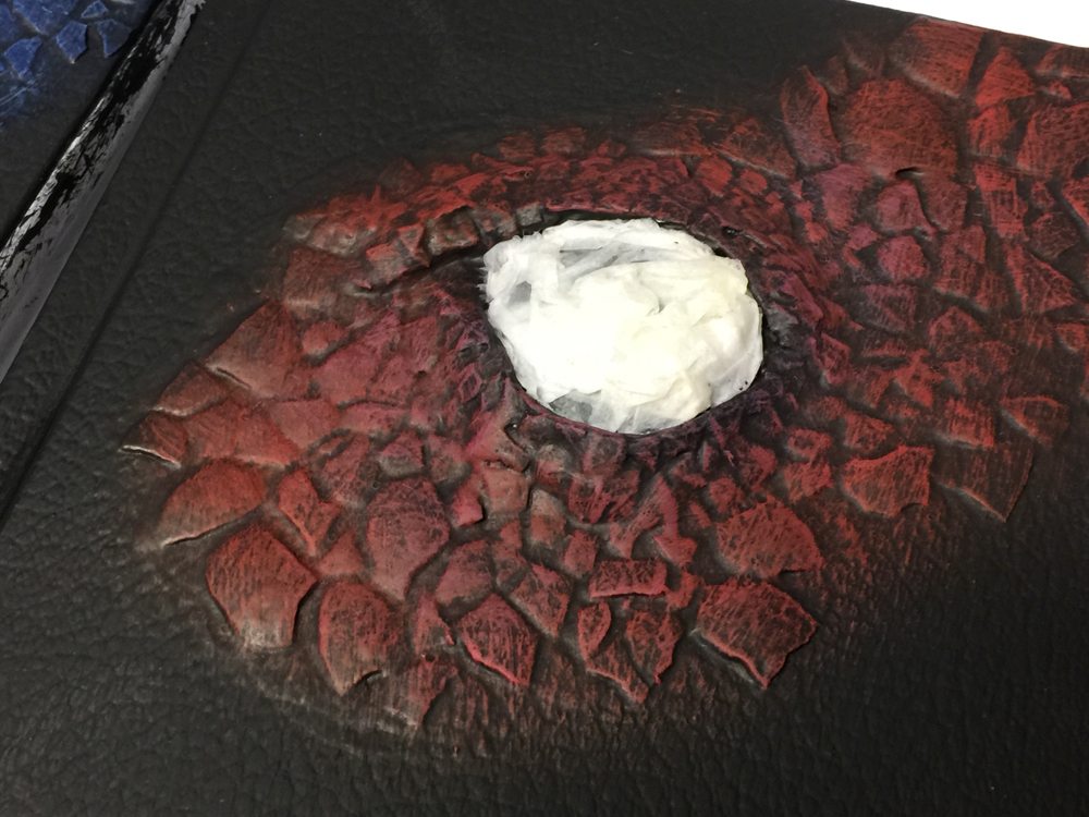 Glass eye covered with paper towel