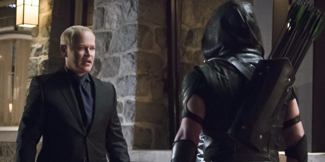 Arrow -- "Blood Debts" -- Image AR410a_0167b.jpg -- Pictured (L-R): Neal McDonough as Damien Darhk and Stephen Amell as The Arrow -- Photo: Katie Yu/ The CW -- Ã?Â&copy; 2015 The CW Network, LLC. All Rights Reserved.