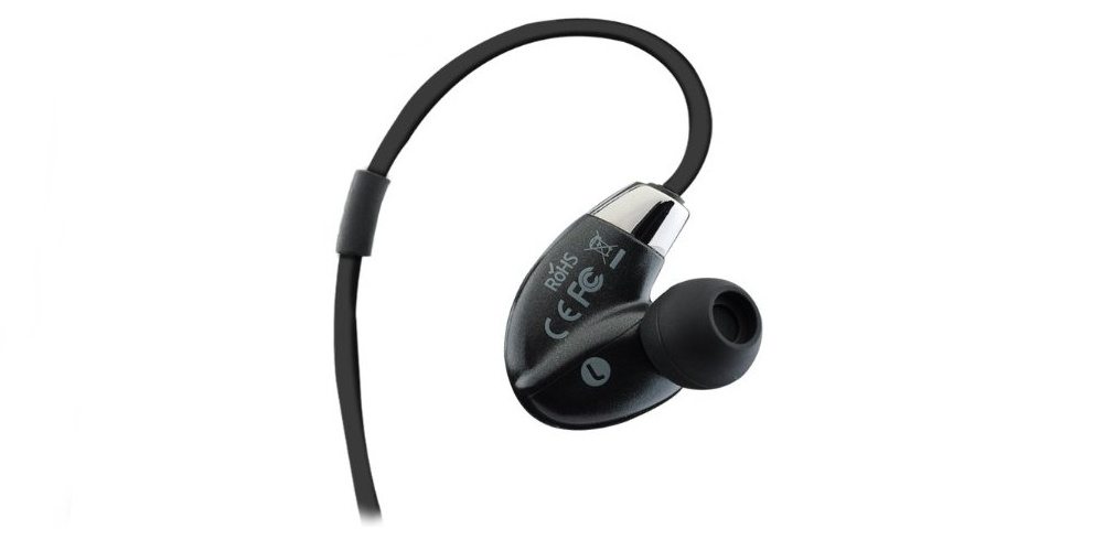 Close-up of a in-ear headphone, showing how its large body is shaped to match an ear's outer structure.