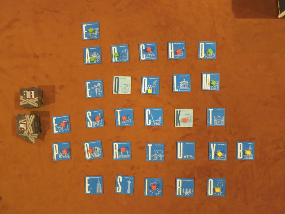 Finally orange gets to go. She places both the P that was her starting tile and the E that yellow gave her. She spells "rocketship" and kicks green off of C and H and yellow gets booted from S, T, O, R, and K. She gets to shoot the Krypton Blaster now and hands yellow an extra tile. Revenge is very sweet!