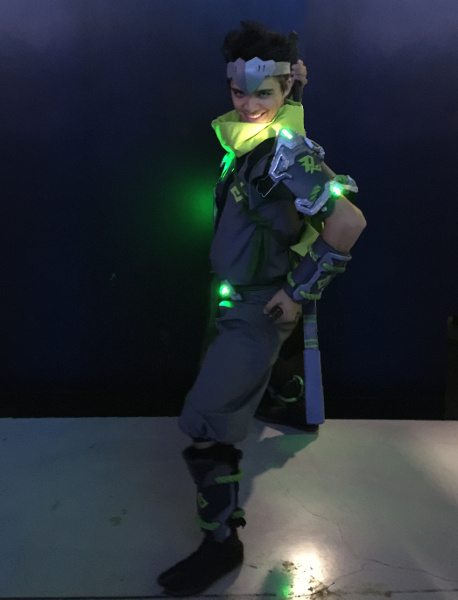A Genji from the game 'Overwatch', human in costume play (cosplay).