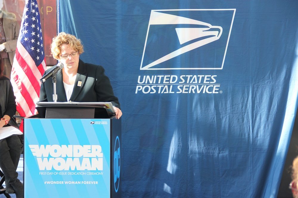 Kristin Seaver of the USPS announcing the stamps. Photo by Jamie Greene.