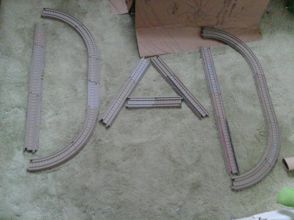The word "Dad" spelled out with Trackmaster tracks