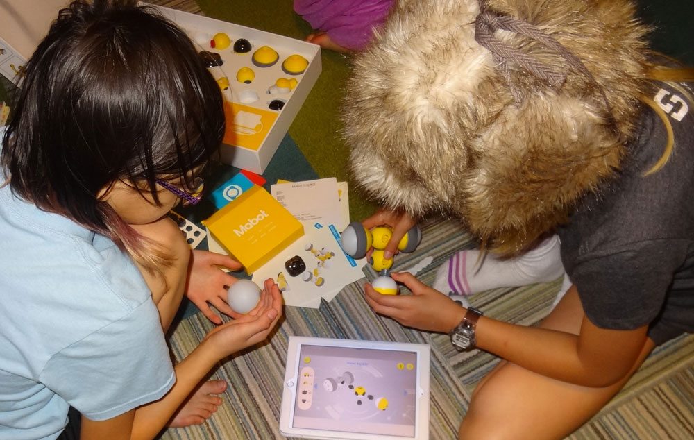 Kids assembling Mabot