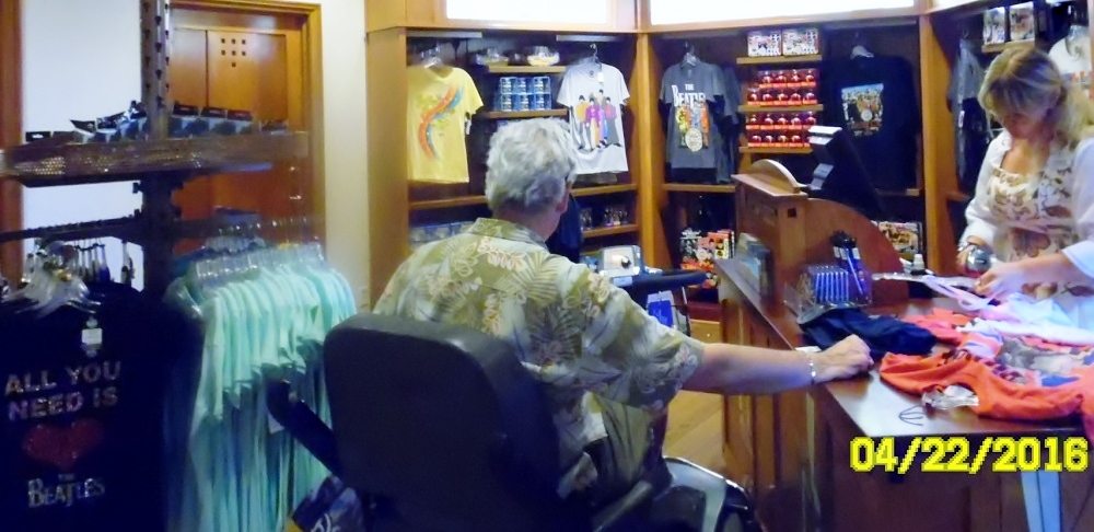 Beatles merchandise-stuffed section of a shop in the UK area of EPCOT