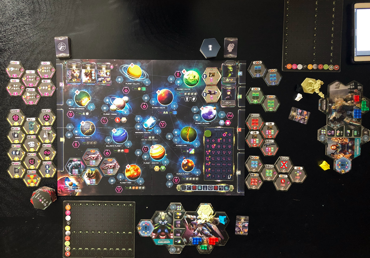 Overhead photo of the tabletop with all of the game components ready to begin a two player session.