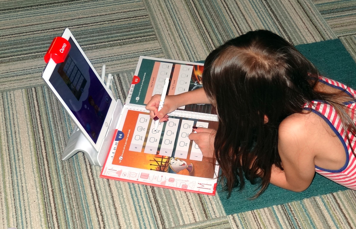 Daughter working on Osmo Byju's workbook