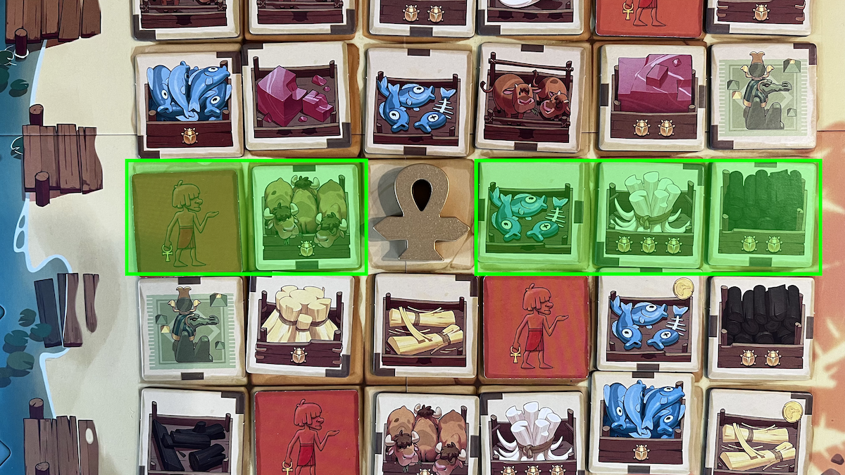 Top down board view with green indicator over the row of tiles that can be selected