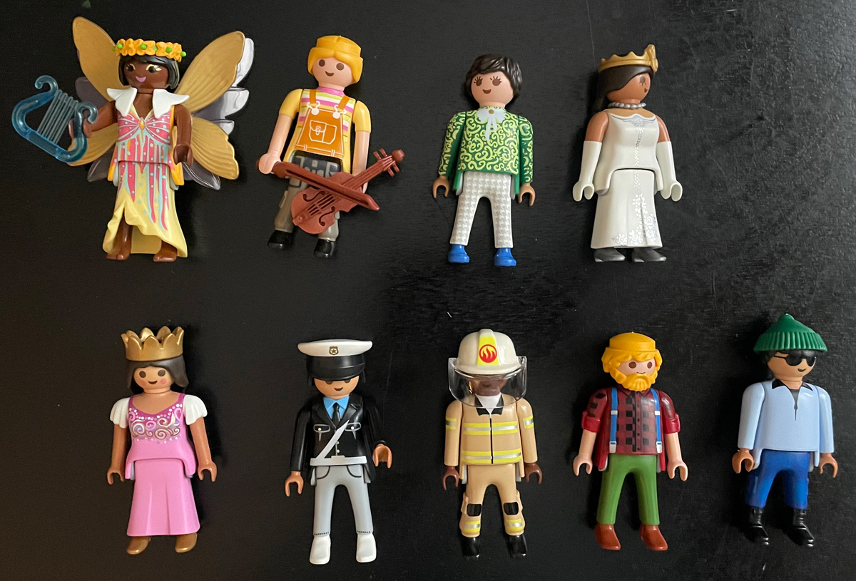 9 custom Playmobil figures laid out in two rows.