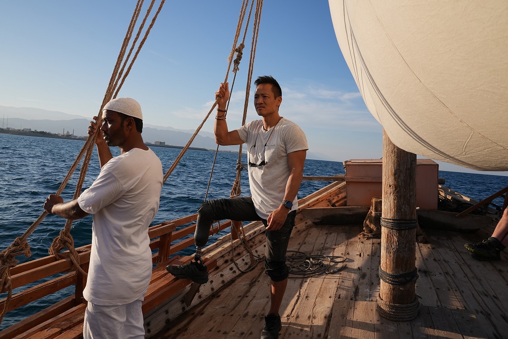 Albert sailing on a boat