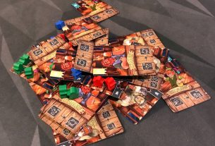 Fantasy Tavern Brawl: a pile of cards and meeples